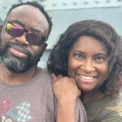 James L. Carr Jr. and his wife Helen, smiling together
